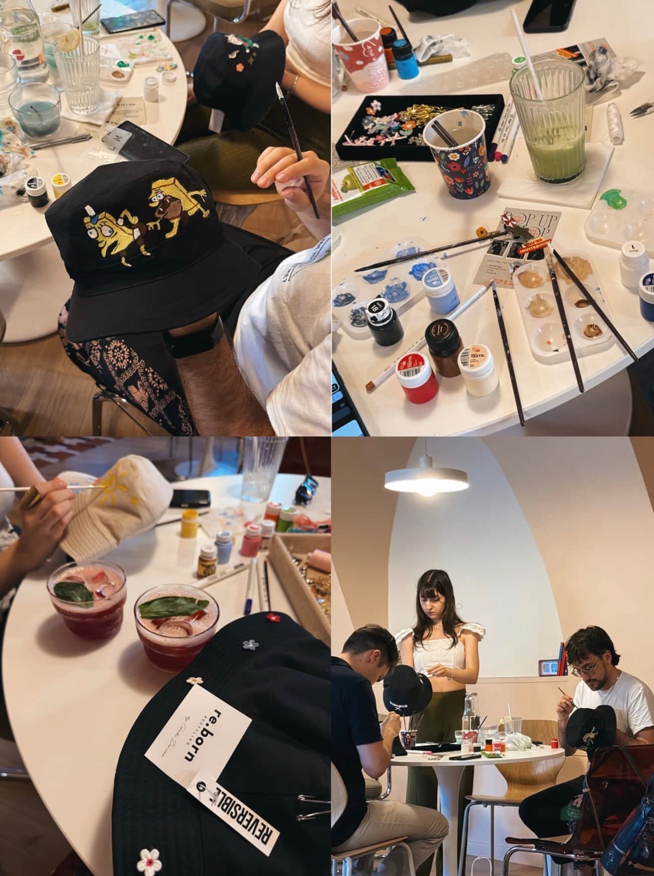 Black bucket hats customised with painted designs, and the table they were made on